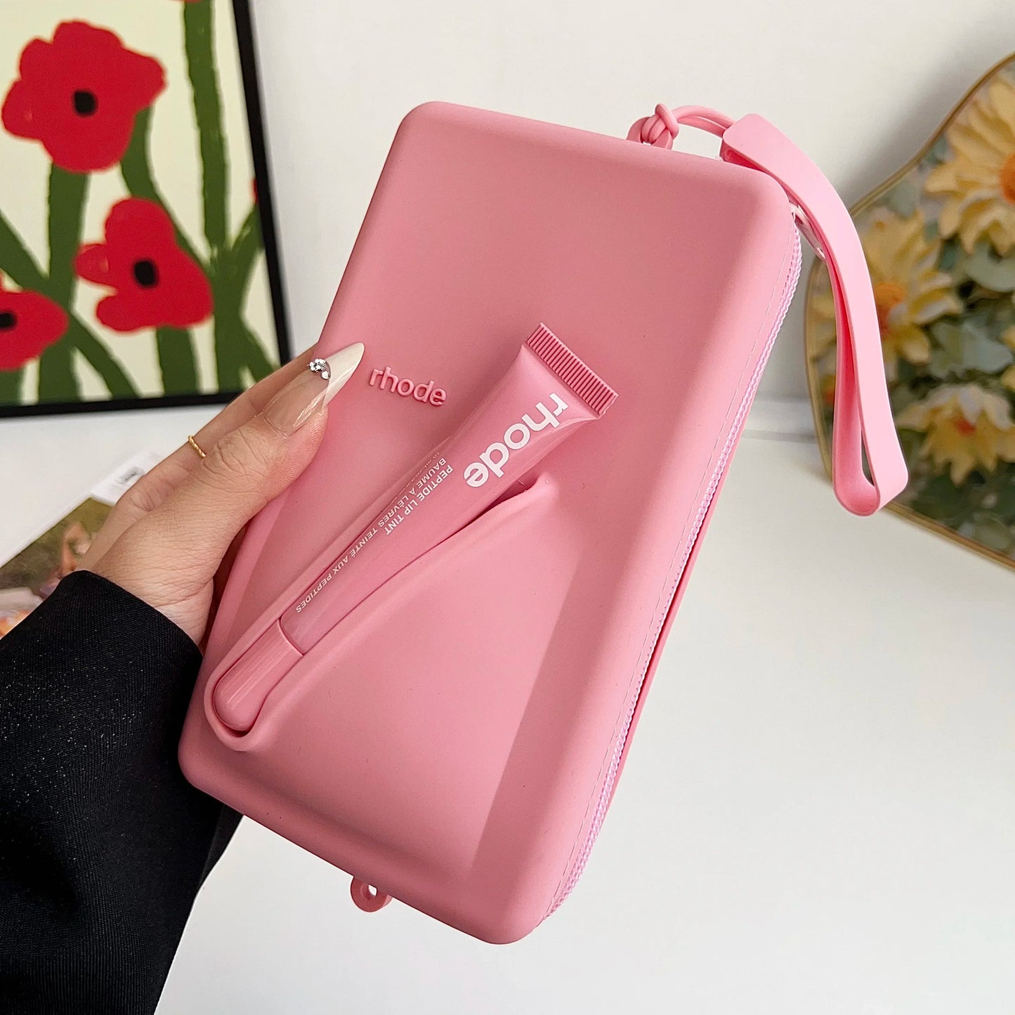 rhode Clutch bag with lip tint