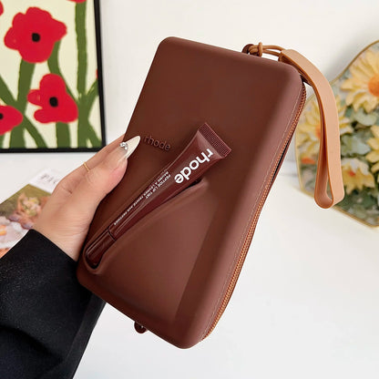 rhode Clutch bag with lip tint