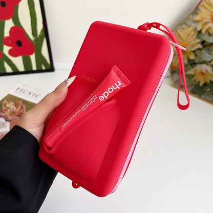 rhode Clutch bag with lip tint